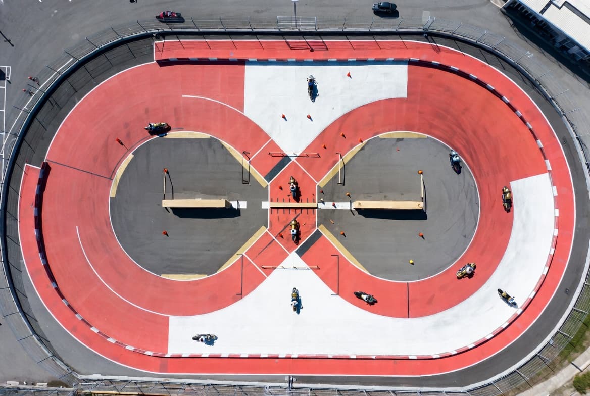 Aerial view of motorcycle training circuit in Singapore with cones and lane markings